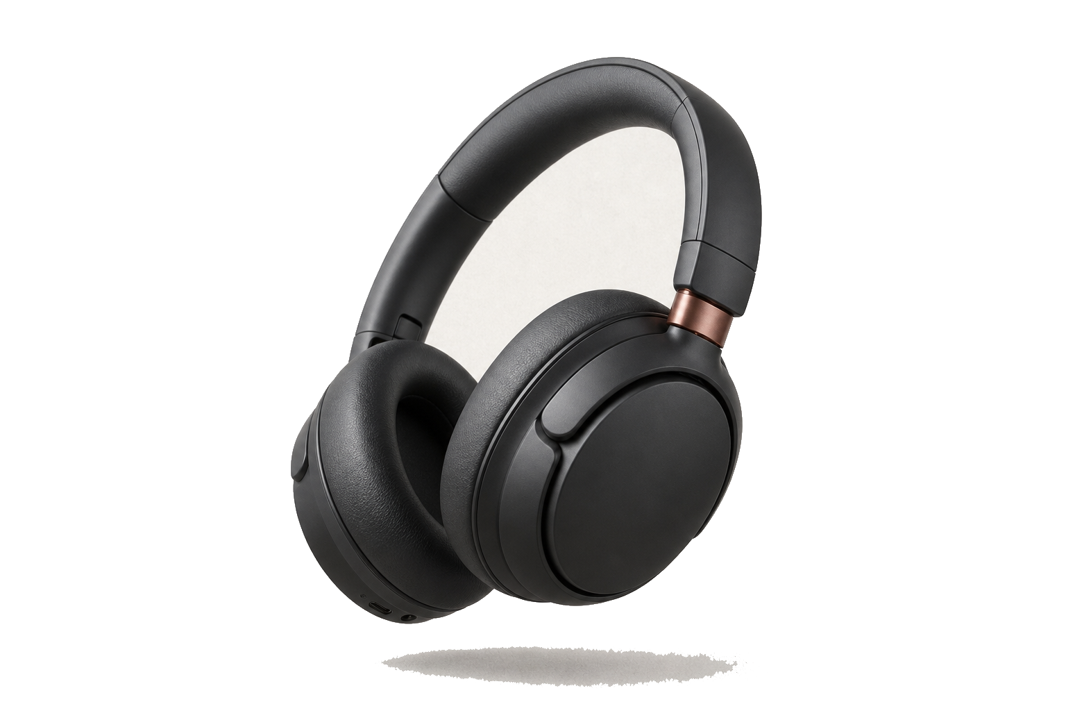 Auralis One over-ear headphones, three-quarter studio view on a warm paper void